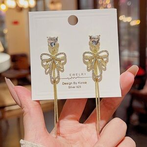 Elegant Gold Bow Earrings by